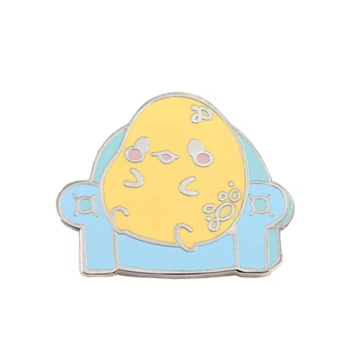 pins-canard-jaune-dans-son-fauteuil
