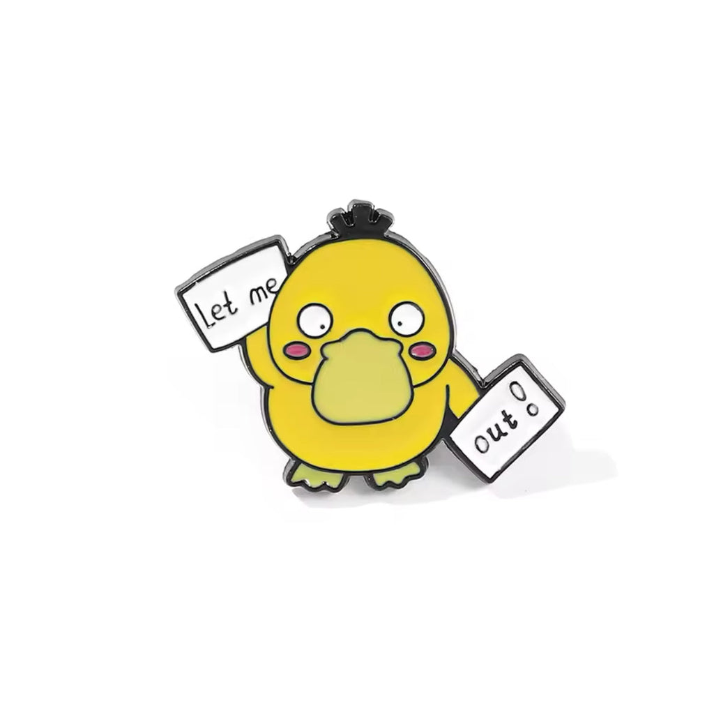 Pin's Canard Jaune "Le me out"