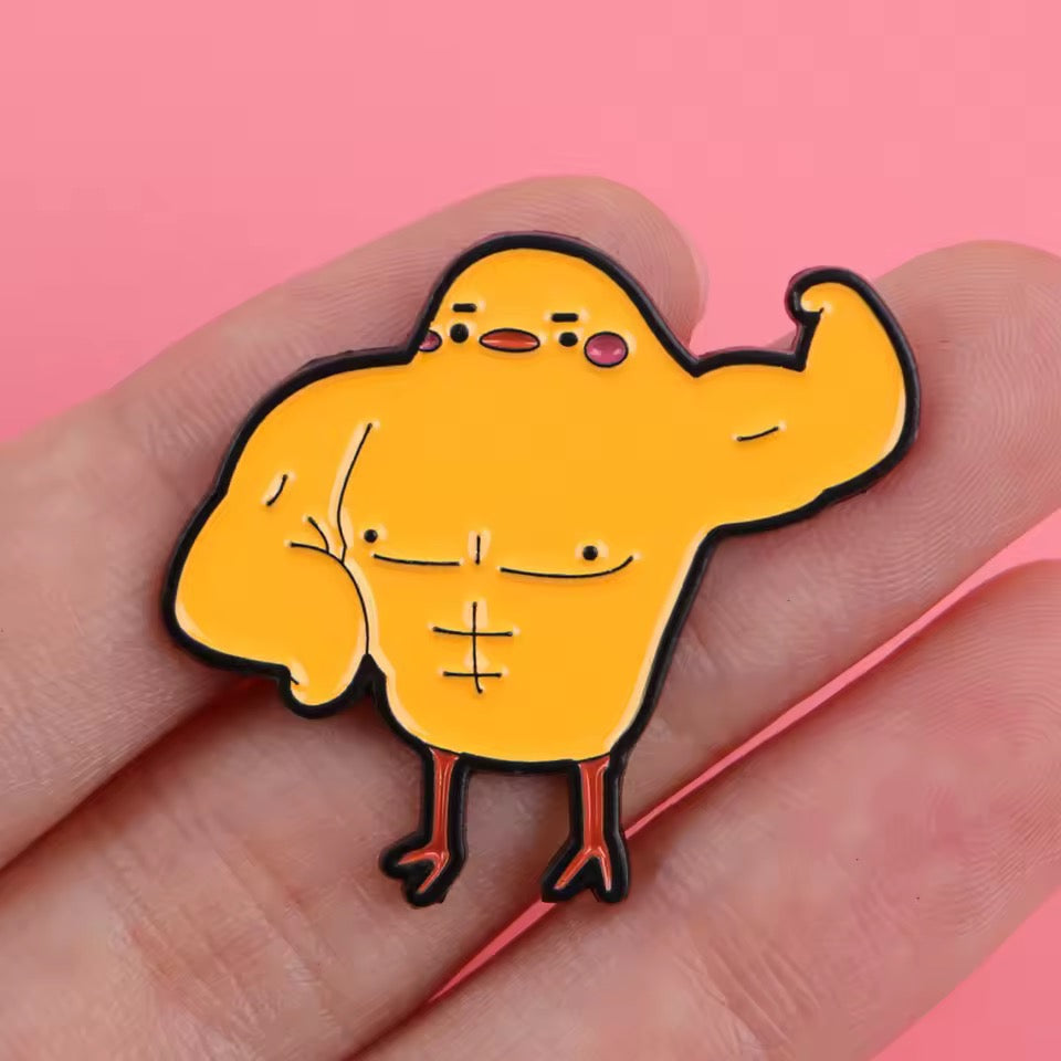 Pin’s Canard Jaune Musclé