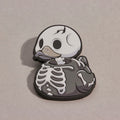 Pin's TUBBZ Numskull – Squelette phosphorescent – visuel 5