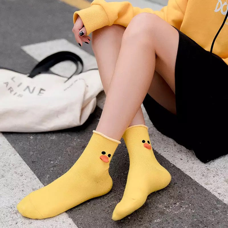 Calcetines de pato amarillo